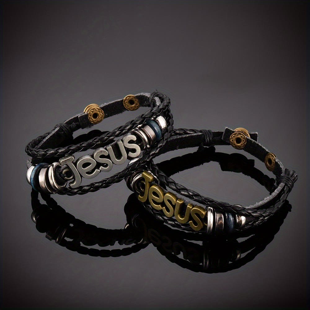 Pulsera de Cuero Trenzado Negro con Dije de Jesús en Dos Tonos