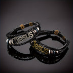 Pulsera de Cuero Trenzado Negro con Dije de Jesús en Dos Tonos