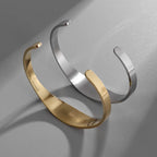 Pulsera Ancha de San Benito "Paz y Protección" en Dorado y Plata