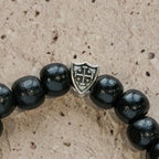 Pulsera Artesanal de Oración de Madera Negra con Doble Escudo Cruz de Jerusalén