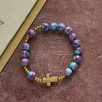 Pulsera Mariana de Piedra Imperial Morada con Cruz Dorada: Devoción con Estilo