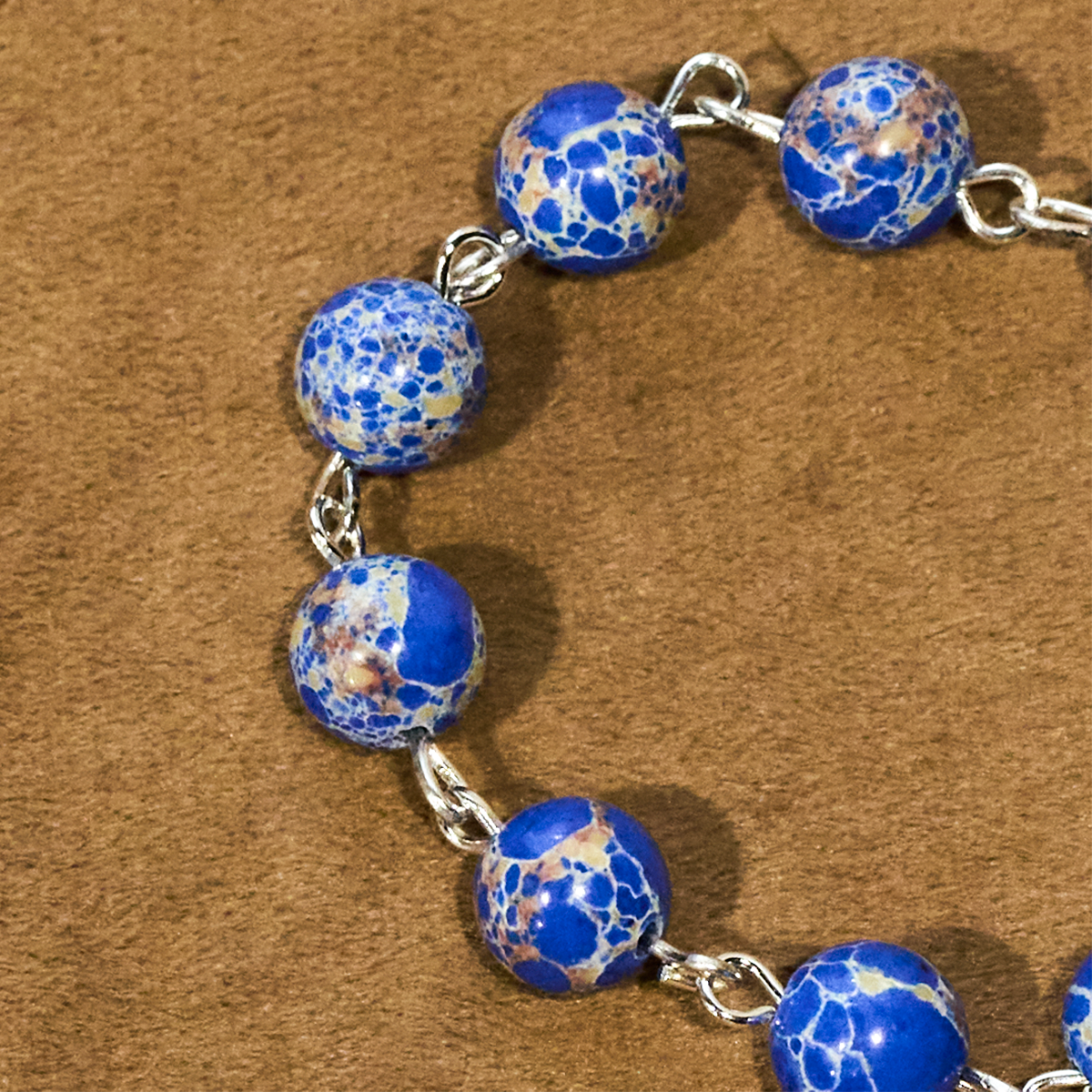 Rosario y Pulsera de Una Decena de Cuentas Azul Rey: Gracia Guiada por la Mano de María