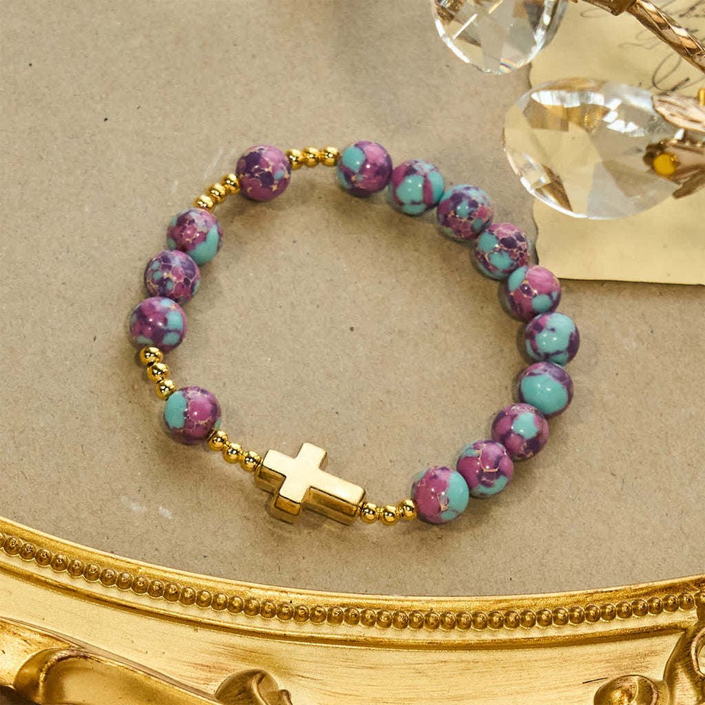 Pulsera Mariana de Piedra Imperial Morada con Cruz Dorada: Devoción con Estilo