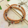 Pulsera Rosario de Cuentas Flor de Durazno: Devoción y Gracia Terrenal