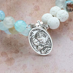 Pulsera Rosario de Yeso y Ágata de Vetas Azules: Devoción y Serenidad Celestial