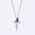 Set de Joyería de Cruz y Mariposa: Devoción y Simbolismo con Arte