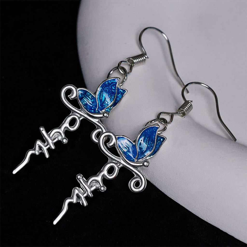 Set de Joyería de Cruz y Mariposa: Devoción y Simbolismo con Arte