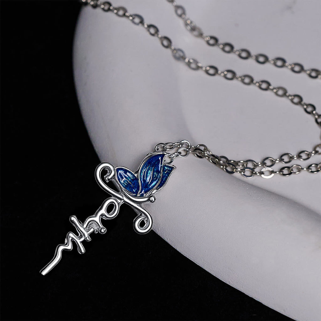 Set de Joyería de Cruz y Mariposa: Devoción y Simbolismo con Arte