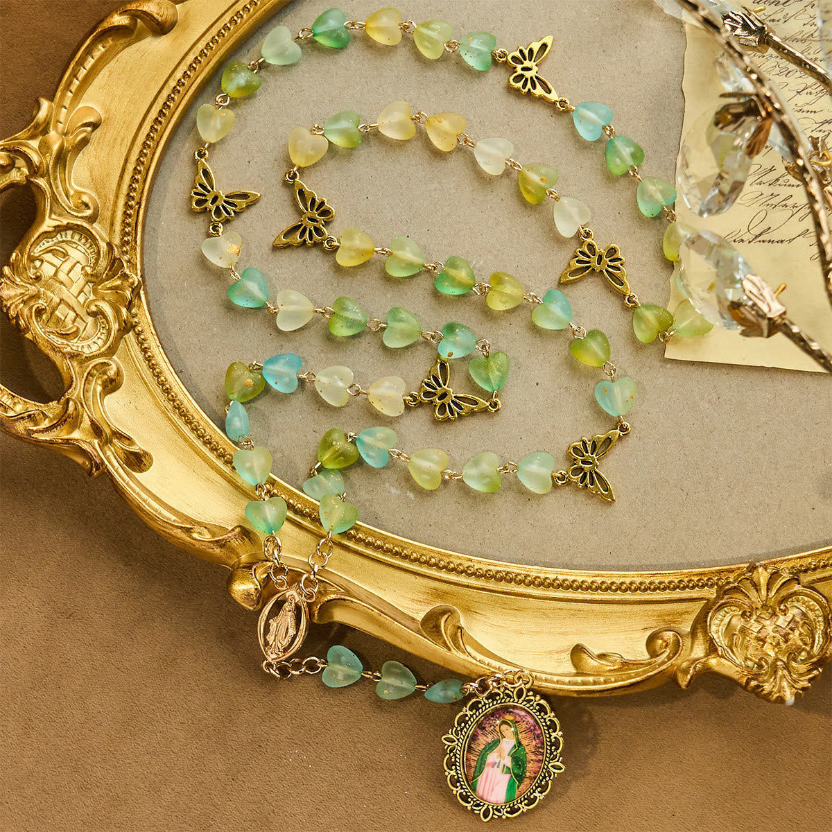 Rosario y Pulsera de Corazón y Mariposa Verde: Devoción y Espiritualidad con Arte