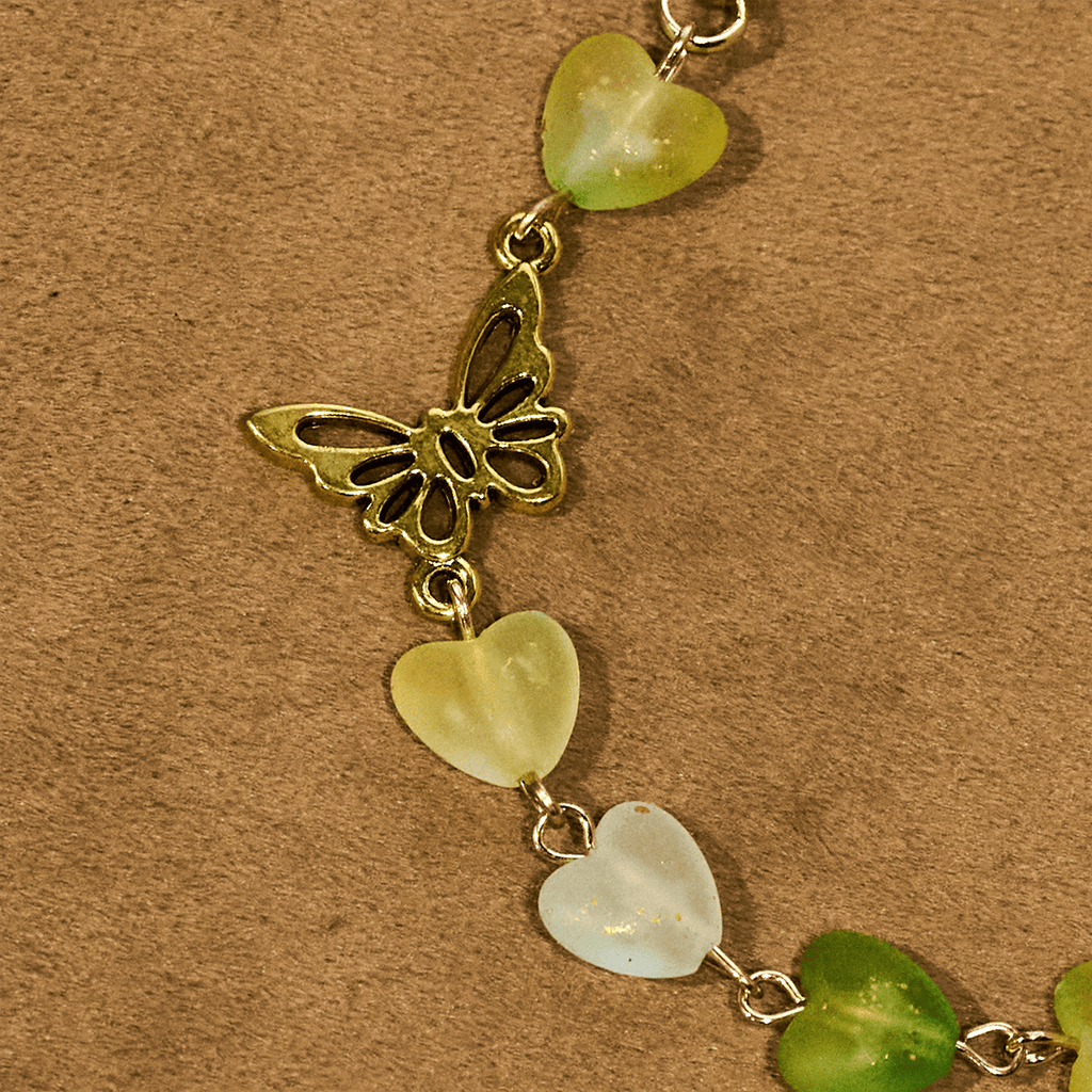 Rosario y Pulsera de Corazón y Mariposa Verde: Devoción y Espiritualidad con Arte