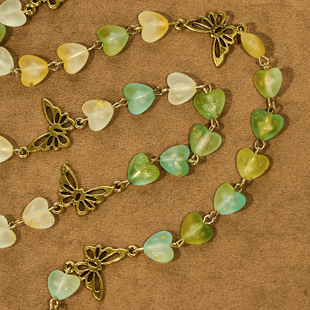 Rosario y Pulsera de Corazón y Mariposa Verde: Devoción y Espiritualidad con Arte