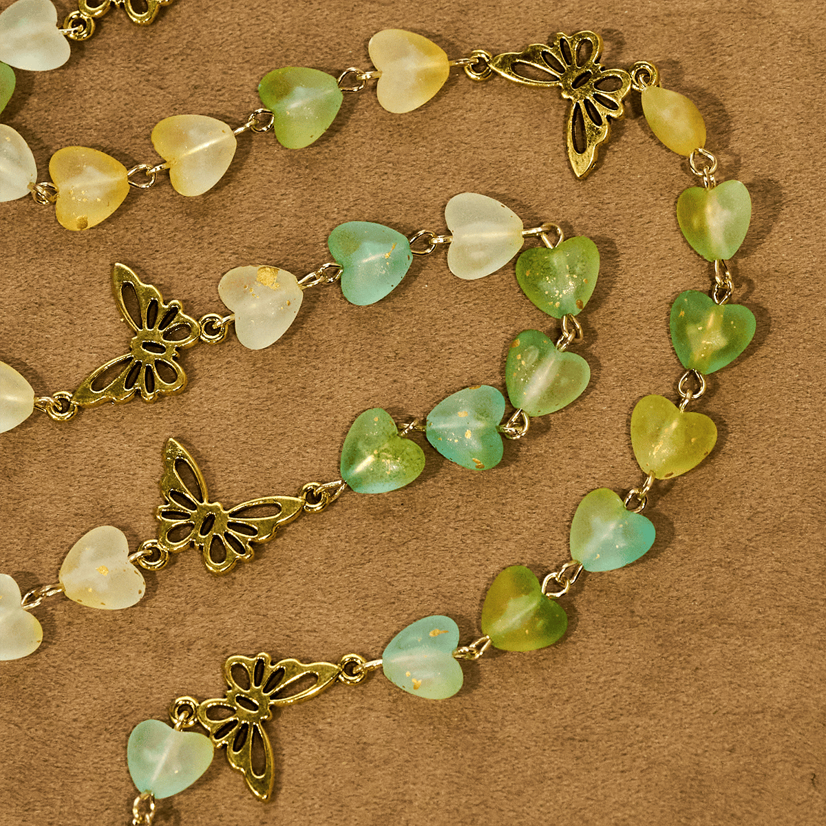 Rosario y Pulsera de Corazón y Mariposa Verde: Devoción y Espiritualidad con Arte