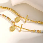 Pulsera de Cuentas con Cruz y la Virgen: Símbolo Espiritual con Elegancia Pulida