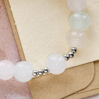 Pulsera de Oración con Cuentas UV que Cambian de Color en Tonos Pastel con la Virgen