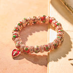 Pulsera de Cuentas Rojas de Esmalte con Dije de Corazón y Cruz