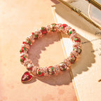 Pulsera de Cuentas Rojas de Esmalte con Dije de Corazón y Cruz