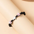 Pulsera de Cuentas Deportivas con Cruz: Devoción para Amantes del Deporte