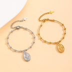 Pulsera con Medalla de la Virgen y Detalle de Cruz: Recordatorio de Fe y Cuidado Diario