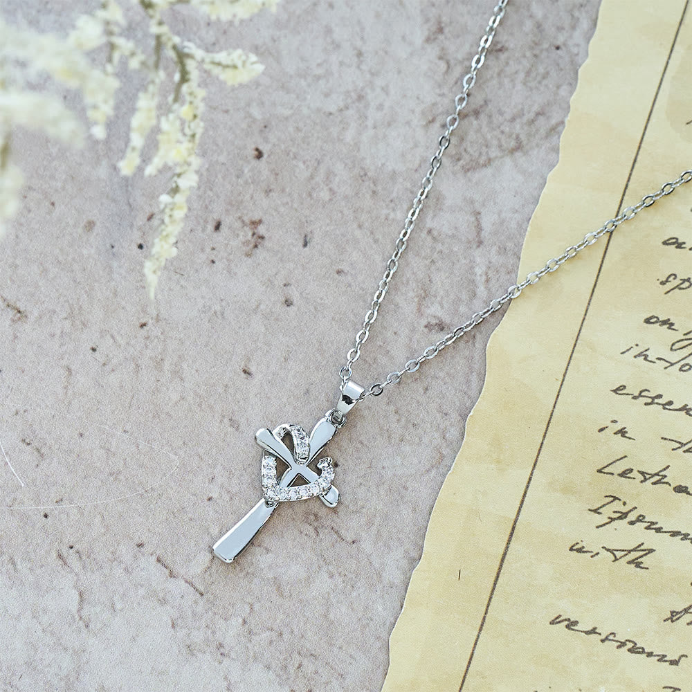 Collar de Corazón y Cruz en Dos Tonos con Circonias: Fusión de Amor y Fe