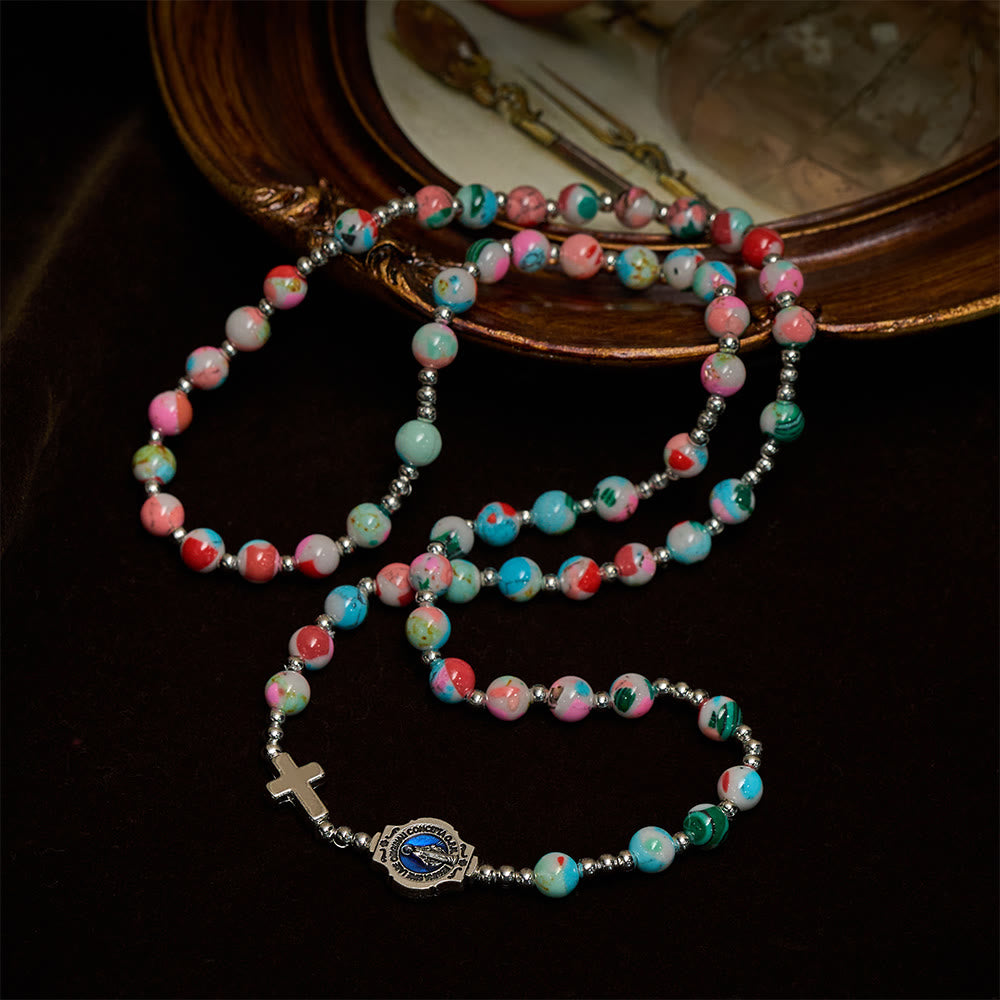 Pulsera Rosario de 6 mm con Brillo UV en Tonos Pastel: Devoción Iluminada