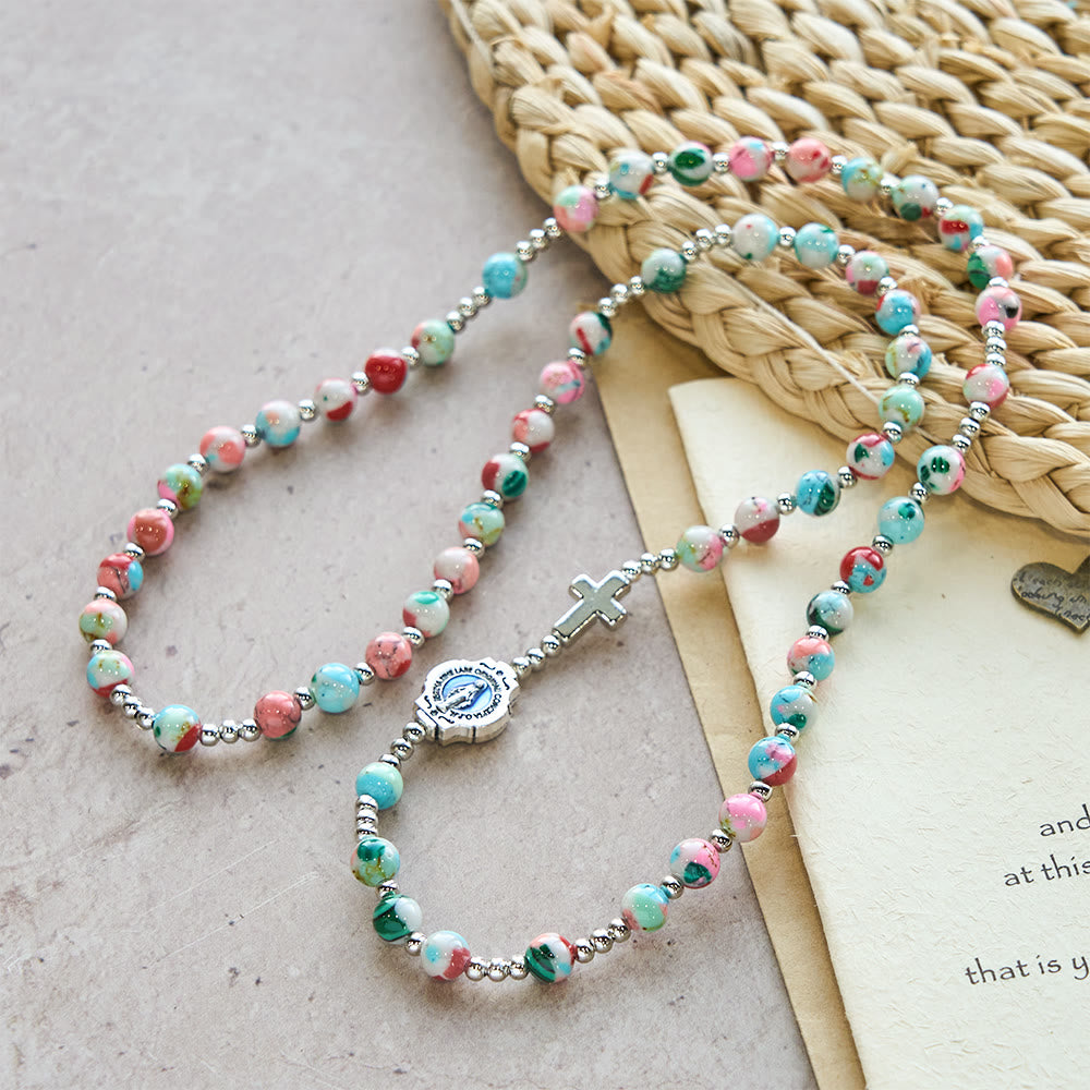 Pulsera Rosario de 6 mm con Brillo UV en Tonos Pastel: Devoción Iluminada