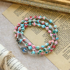Pulsera Rosario de 6 mm con Brillo UV en Tonos Pastel: Devoción Iluminada
