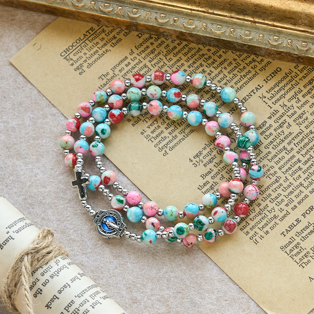 Pulsera Rosario de 6 mm con Brillo UV en Tonos Pastel: Devoción Iluminada