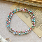 Pulsera Rosario de 6 mm con Brillo UV en Tonos Pastel: Devoción Iluminada