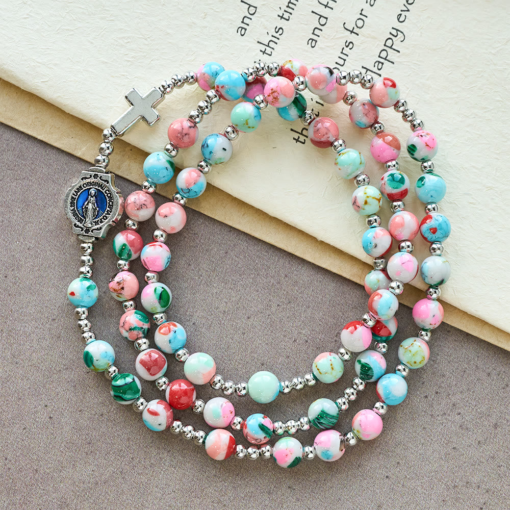 Pulsera Rosario de 6 mm con Brillo UV en Tonos Pastel: Devoción Iluminada