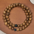 Pulsera de Cruz de Madera por Capas: Devoción Serena para el Día a Día