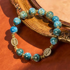 Pulsera Devocional Vintage Azul de 10 mm Estilo Óleo con Medalla Milagrosa