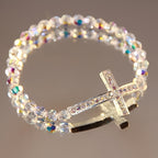 Pulsera de Cruz Blanca y Azul Pavo Real: Fe Envuelta en Brillo