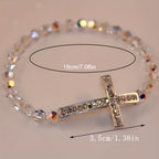 Pulsera de Cruz Blanca y Azul Pavo Real: Fe Envuelta en Brillo