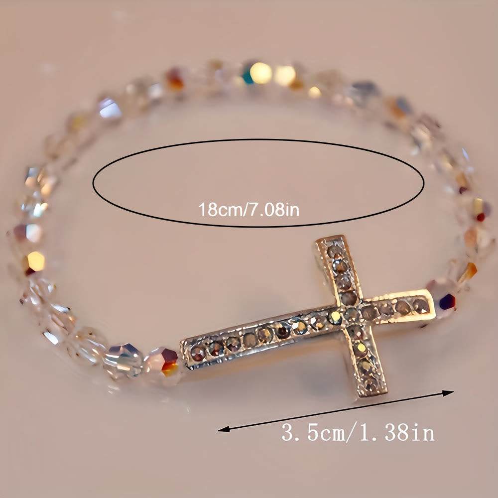 Pulsera de Cruz Blanca y Azul Pavo Real: Fe Envuelta en Brillo