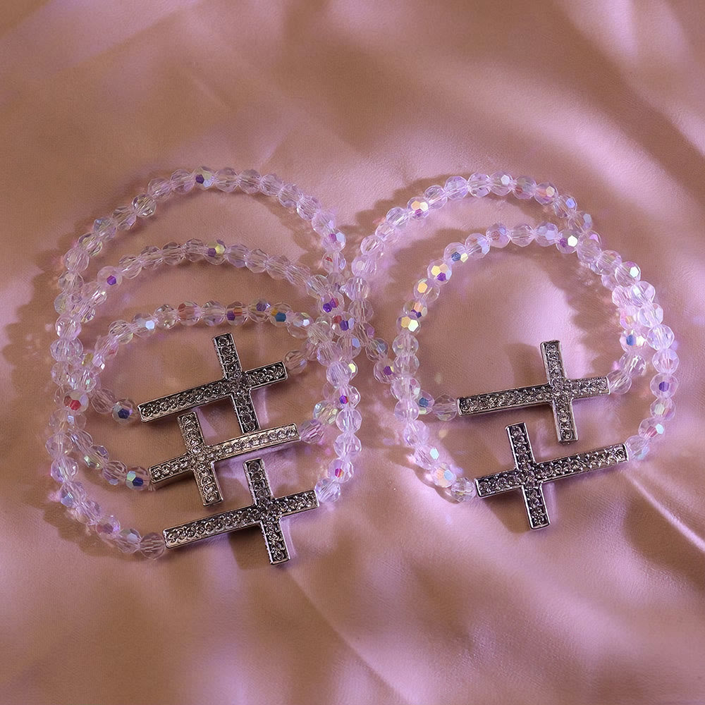 Pulsera de Cruz Blanca y Azul Pavo Real: Fe Envuelta en Brillo