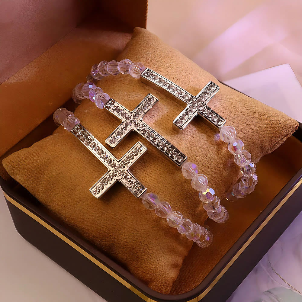 Pulsera de Cruz Blanca y Azul Pavo Real: Fe Envuelta en Brillo