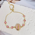 Pulsera de la Virgen con Circonia Multicolor: Recordatorio Sereno de Su Cuidado