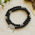 Pulsera de Cuentas de Madera Doble Guardián con San Benito y Medalla Milagrosa