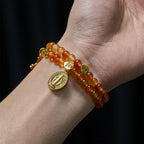 Pulsera Rosario Caramelo Cálido con Detalle de JESÚS y la Virgen