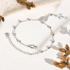 Pulsera con Dije de la Virgen y Crucifijo: Su Gracia en tu Muñeca
