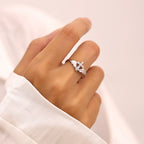 Anillo de Plata Cruz con Alas y Circonitas: Encarna Su Protección Angelical