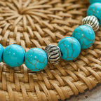Pulsera Artesanal con Dije de Cruz y Cuentas de Turquesa