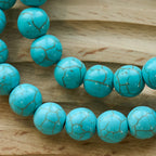 Pulsera Cristiana de Cruz con Cuentas de Turquesa de 10 mm