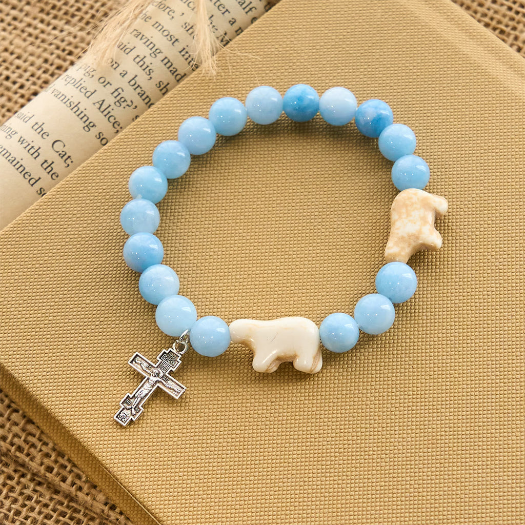 Pulsera Artesanal de Cruz con Cuentas Azules Oso Polar: Salvemos a los Osos Polares