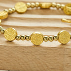 Pulsera Elástica de Cruz de San Benito Tono Oro