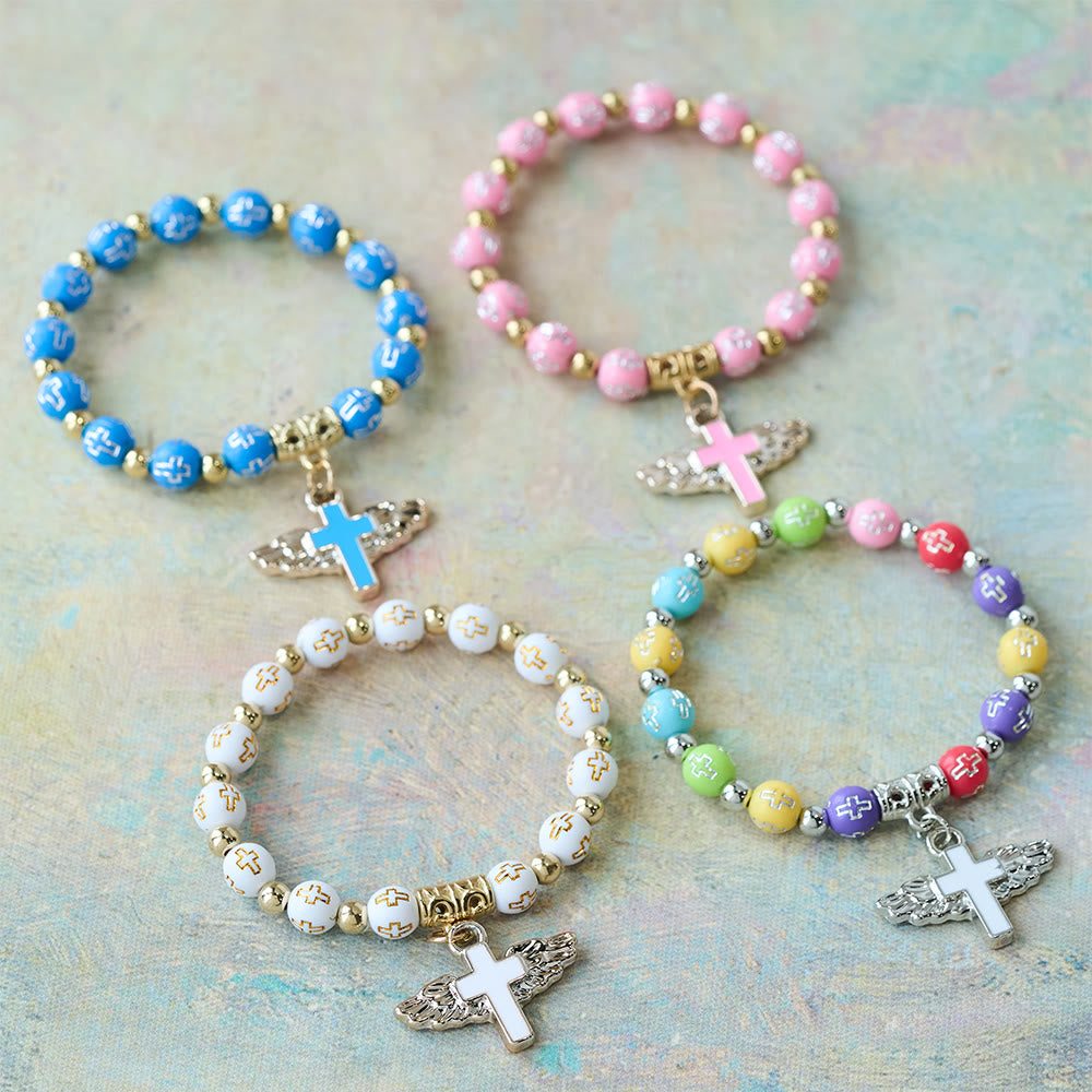 Pulsera con Dije de Cruz Alada: Oración Visual de Devoción y Conexión