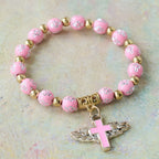 Pulsera con Dije de Cruz Alada: Oración Visual de Devoción y Conexión