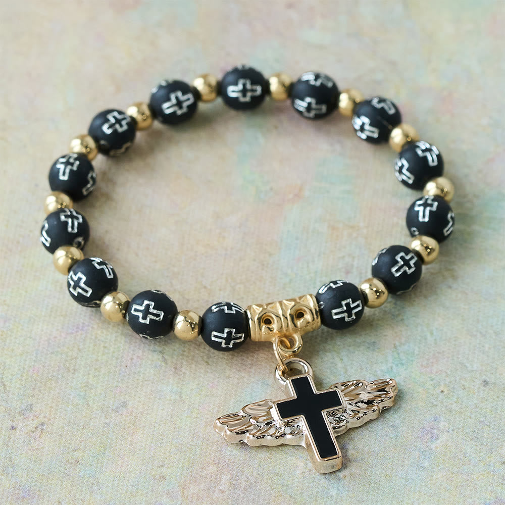 Pulsera con Dije de Cruz Alada: Oración Visual de Devoción y Conexión