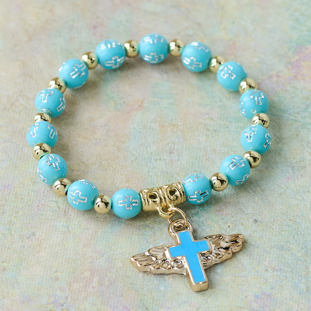 Pulsera con Dije de Cruz Alada: Oración Visual de Devoción y Conexión