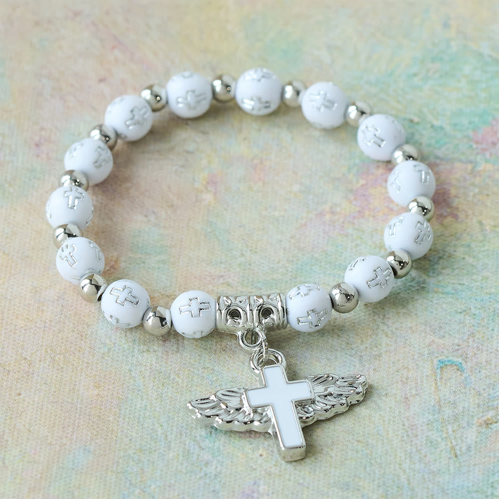 Pulsera con Dije de Cruz Alada: Oración Visual de Devoción y Conexión